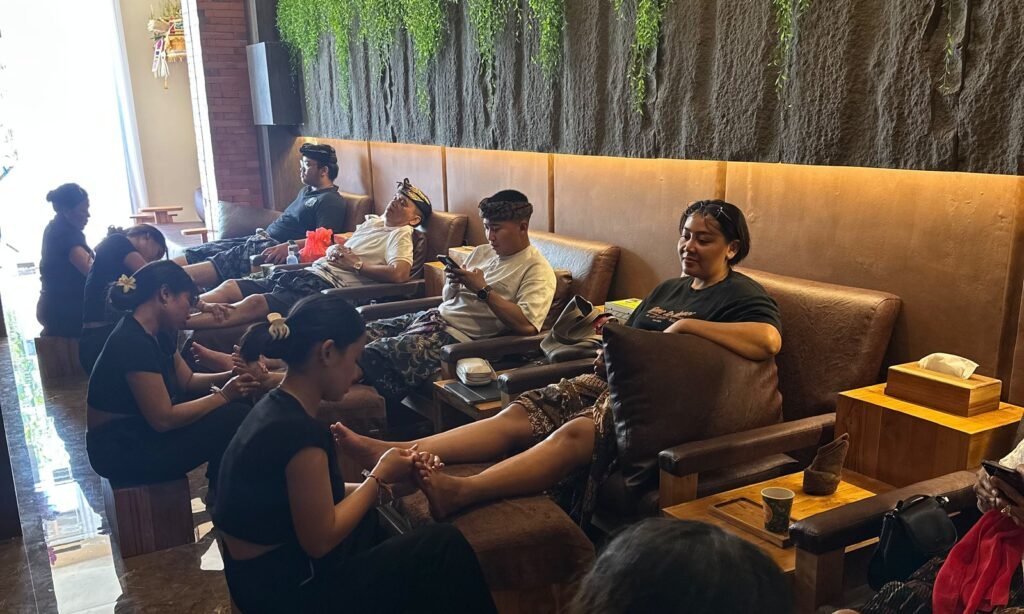 Guests having foot reflexology in the lounge at Ayu Dewi Spa & Wellness